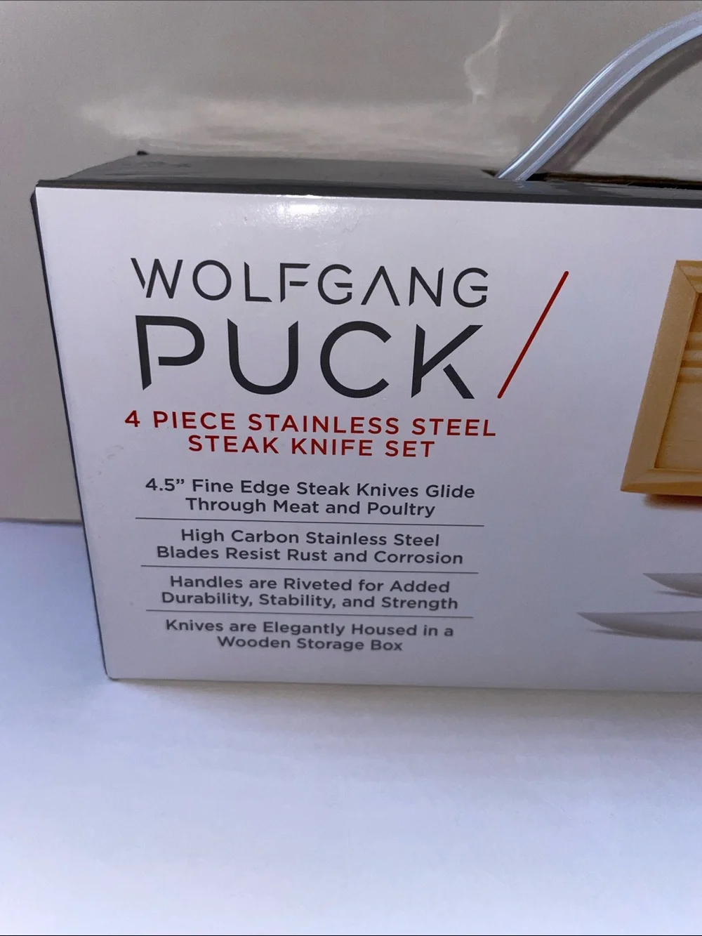 NIB Wolfgang Puck 4-Piece Stainless Steel Steak Knife Set.